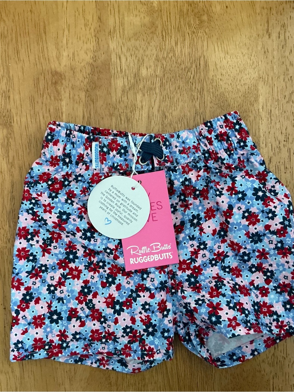 Ruffle Butts Floral Shorts in Red, Blue & Pink